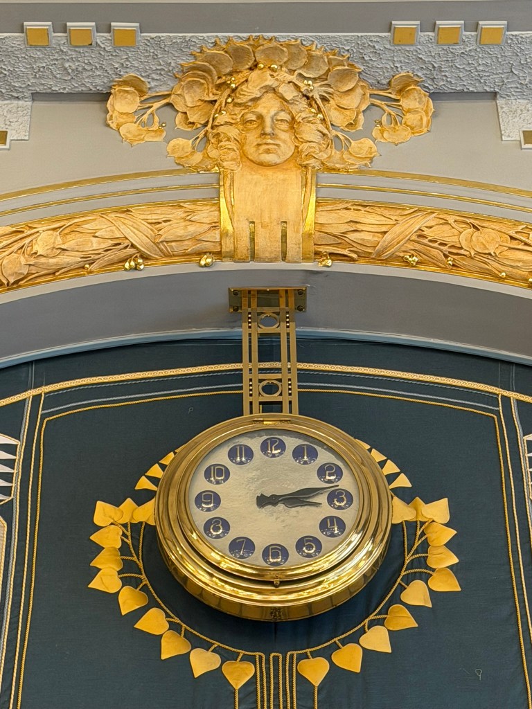Stylized art-deco Linden leaves in the Riegr Room of the Prague Municipal House (Feb. 22, 2026 © Nicolette L. Cagle)
